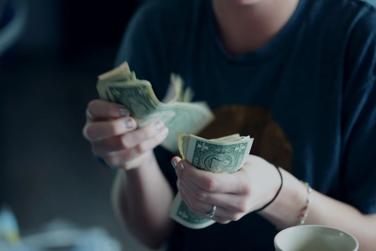 women counting her cash